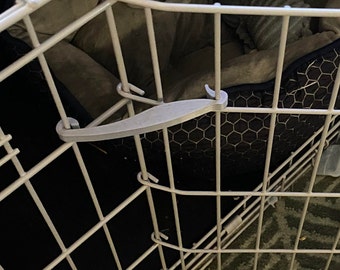 Catch to stop your dog shutting themselves out of their crate by accident!