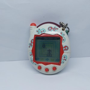 Tamagotchi Tamagotchi Shareholder White Goldfish Plus Virtual Pet Game Used Japanese