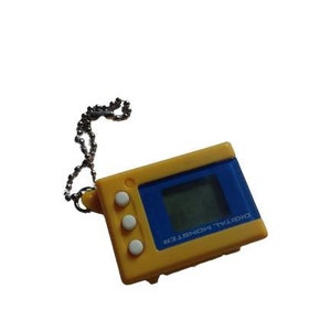 May include: A yellow and blue digital pet toy with a chain. The toy has three buttons and the text "DIGITAL MONSTER" on the front.