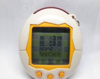 Tamagotchi Connection V1 white Yellow English Version Virtual Pet
