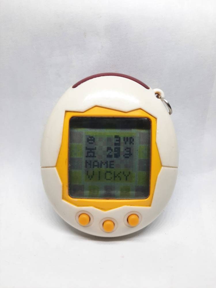 Tamagotchi Connection V1 white Yellow English Version Virtual Pet