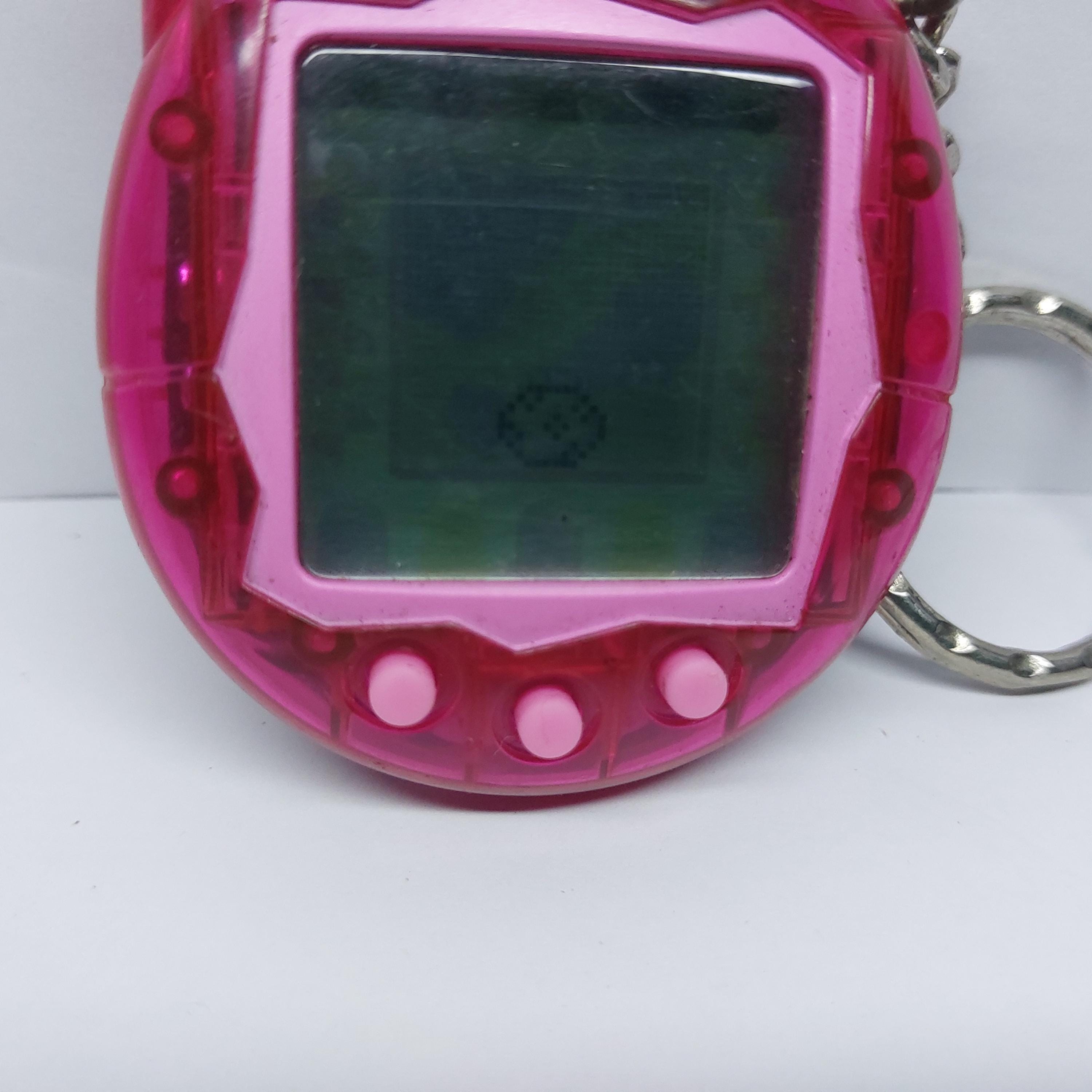 Vintage 2004 Tamagotchi Connection V3 Pink Translucent Used