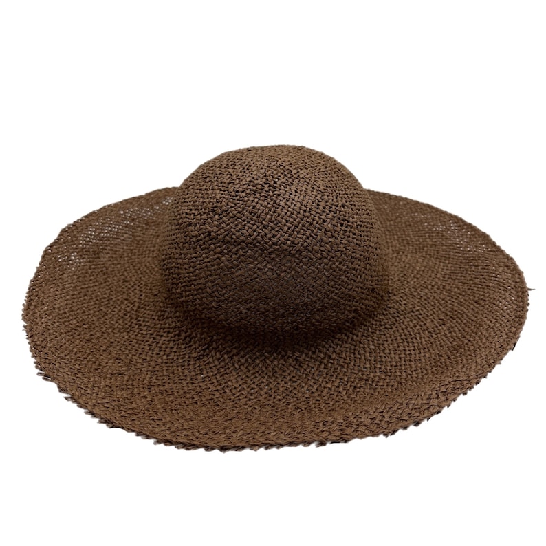 May include: A brown woven straw sun hat with a wide brim.