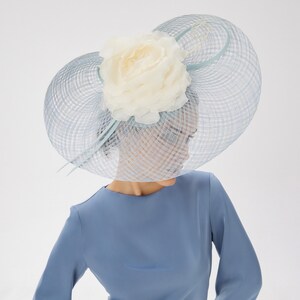 Blue fascinator derby hat for women with flower - Divahats boutique