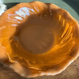 Vintage Fire King Peach Lustre Ruffled Fluted Bowl made by Anchor Hocking in the mid-20th century