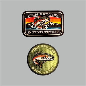 May include: Two embroidered patches with a fishing theme. The top patch is rectangular with a trout leaping from water, mountains, and the text "FISH AROUND & FIND TROUT." The bottom patch is circular with a trout and the same text.