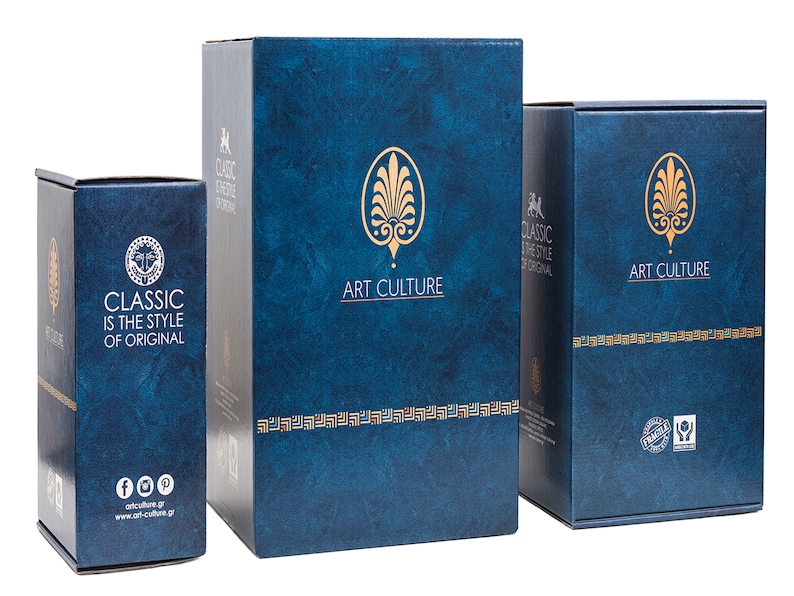 May include: Three blue boxes with gold accents. The largest box has the text "ART CULTURE" on the front. The middle box has the text "CLASSIC IS THE STYLE OF ORIGINAL" on the front. The smallest box has the text "ART CULTURE" on the front.