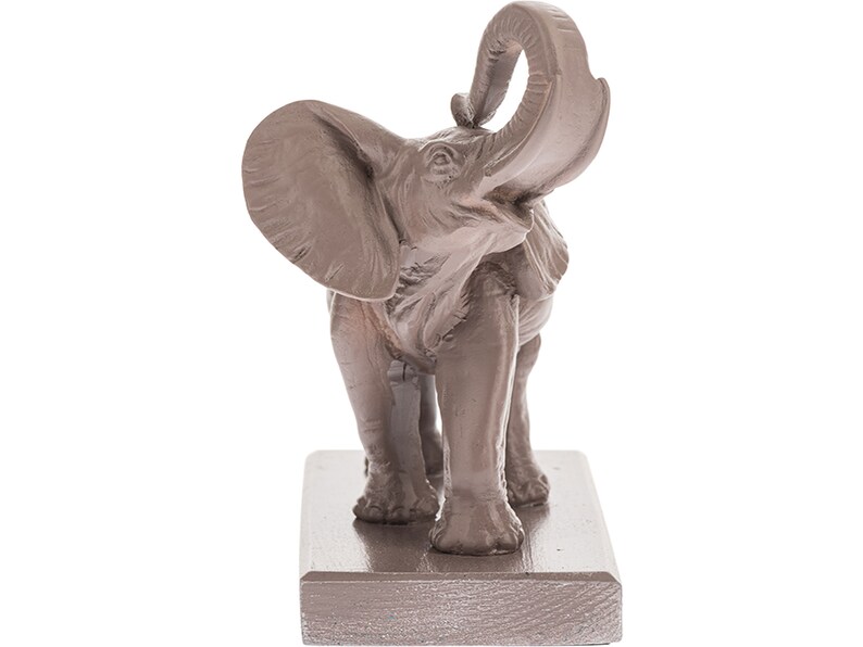 May include: A brown ceramic elephant figurine with its trunk raised in the air. The elephant is standing on a rectangular base.