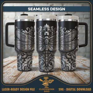May include: A black stainless steel tumbler with a silver dragonfly and floral design. The design is seamless and wraps around the entire tumbler. The tumbler has a lid and a handle.