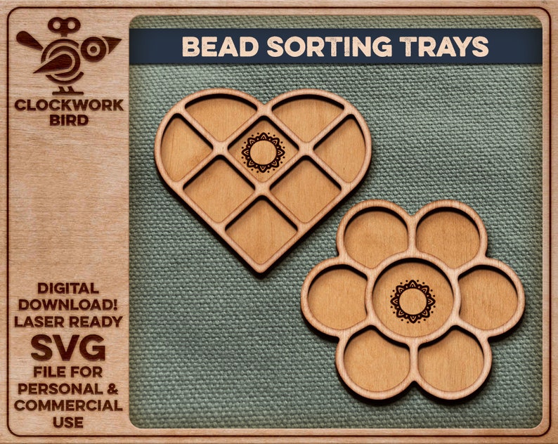 May include: Two wooden bead sorting trays, one shaped like a heart and the other like a flower. Both trays have a decorative design in the centre and are laser cut.