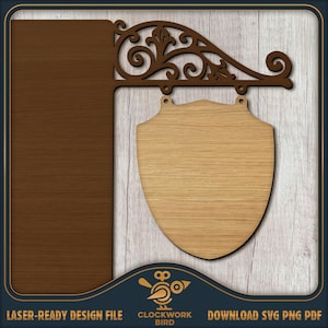 May include: A laser-ready design file featuring a wooden sign with a shield-shaped plaque and an ornate bracket. The sign is made of light and dark brown wood. The text "LASER-READY DESIGN FILE" and "CLOCKWORK BIRD" are visible.