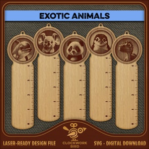 May include: Set of five wooden ruler bookmarks featuring different exotic animals. Each bookmark has a ruler on the side with markings from 0 to 4 inches. The animals featured are a dolphin, koala, panda, penguin, and a dinosaur.