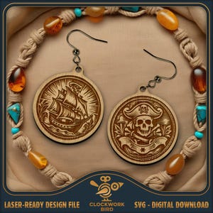 May include: Two round wooden earrings featuring laser-engraved designs. One earring displays a sailing ship with a skull on the sail, and the other shows a skull wearing a pirate hat with crossed bones. Both have black metal earring hooks.