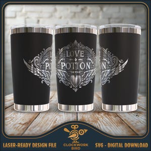 May include: Three stainless steel tumblers with black powder coating and a silver design. The design features a stylized heart with wings and the text "Love Potion".