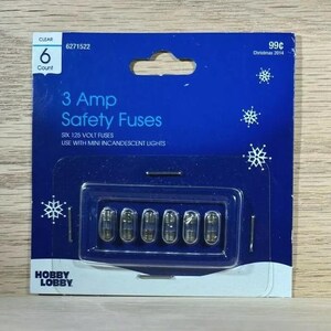 May include: A package of six 3 amp safety fuses for use with mini incandescent lights. The package is blue and white with the text "3 Amp Safety Fuses" and "Six 125 Volt Fuses".