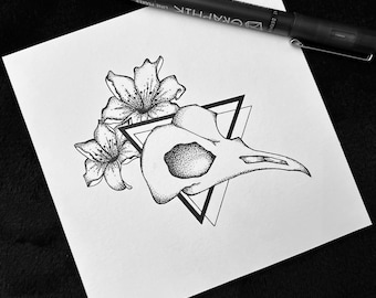 Calavera de pájaro con estampado floral