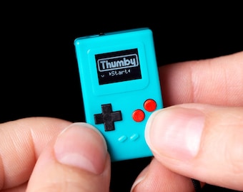 Thumby ™ - Miniatur, Spielbar, Programmierbar, Schlüsselanhänger, Spielkonsole.