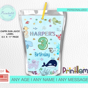 Puede incluir: Etiqueta de caja de jugo imprimible con una escena de océano azul con criaturas marinas, una ballena, un pulpo y un caballito de mar. La etiqueta dice "Harper's 3rd Birthday".