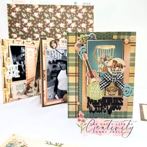 May include: A handmade scrapbook with a Wild West theme. The cover features a guitar, a horse, and the text "Wild West Vibes." Inside are photos and decorative elements. The background includes floral and plaid patterns, with the text "Memories With You."