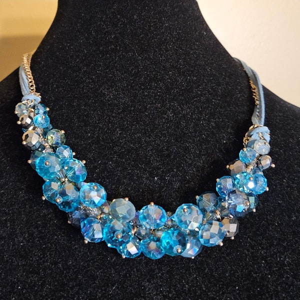 Lovely Ali-Khan Teal and Blues New York Glass Beaded Necklace. Goldtone Chain with Light Blue Suede Cord.