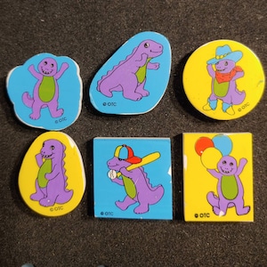 12 Vintage Novelty Erasers. Cute Dinosaurs in Various Outfits and Activities. Never Used. In Original Package. Made in Taiwan.