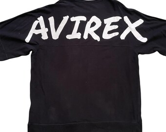 AVIREX Sudadera con cuello redondo y estampado de logotipo grande en la espalda, talla XL, color negro, manga larga, jersey extragrande, estilo militar, ropa de calle