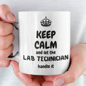 May include: White ceramic mug with a black crown and the text "Keep Calm and let the Lab Technician handle it".