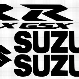 May include: Black Suzuki motorcycle decals. Includes the Suzuki logo, GSX, and RR lettering. The decals are in a bold, sans-serif font, perfect for customizing a motorcycle. The decals are displayed on a grid background.