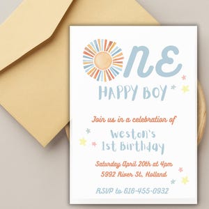 May include: A blue and white invitation with a colorful sun design and the text "One Happy Boy". The invitation is for a first birthday party and includes the date, time, and location of the party. RSVP information is also included.