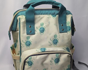 Turtle Recall Nappy Changing Bag - Baby Change Backpack - Diaper Rucksack Satchel - Travel Bag for Mum & Baby - Cute Fun Green Design