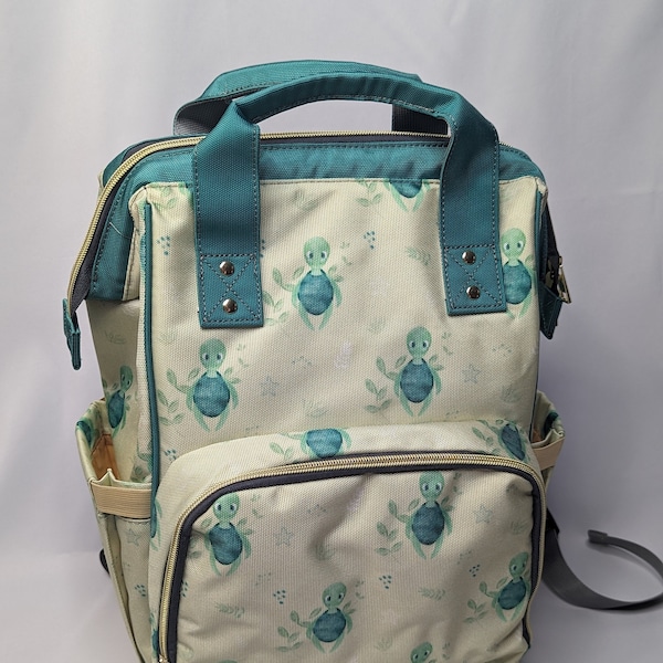 Turtle Recall Nappy Changing Bag - Baby Change Backpack - Diaper Rucksack Satchel - Travel Bag for Mum & Baby - Cute Fun Green Design