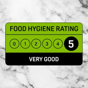 May include: A green and black food hygiene rating sign with a rating of 5, indicating "Very Good".