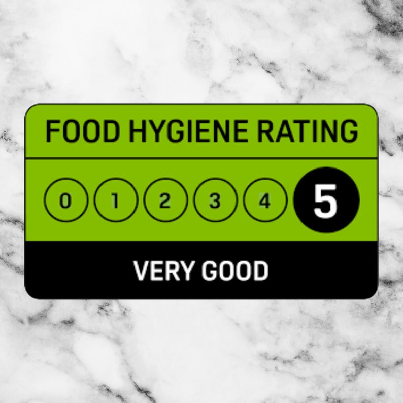 May include: A green and black food hygiene rating sign with a rating of 5, indicating "Very Good".