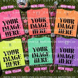 May include: Six colorful t-shirts in neon shades of pink, coral, melon, yellow, mint, and violet. Each shirt displays the text "YOUR IMAGE HERE" in bold black letters. The shirts are arranged on a green surface with disco balls and floral decorations.