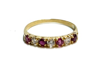 14k gold ring set with ruby and zirconia