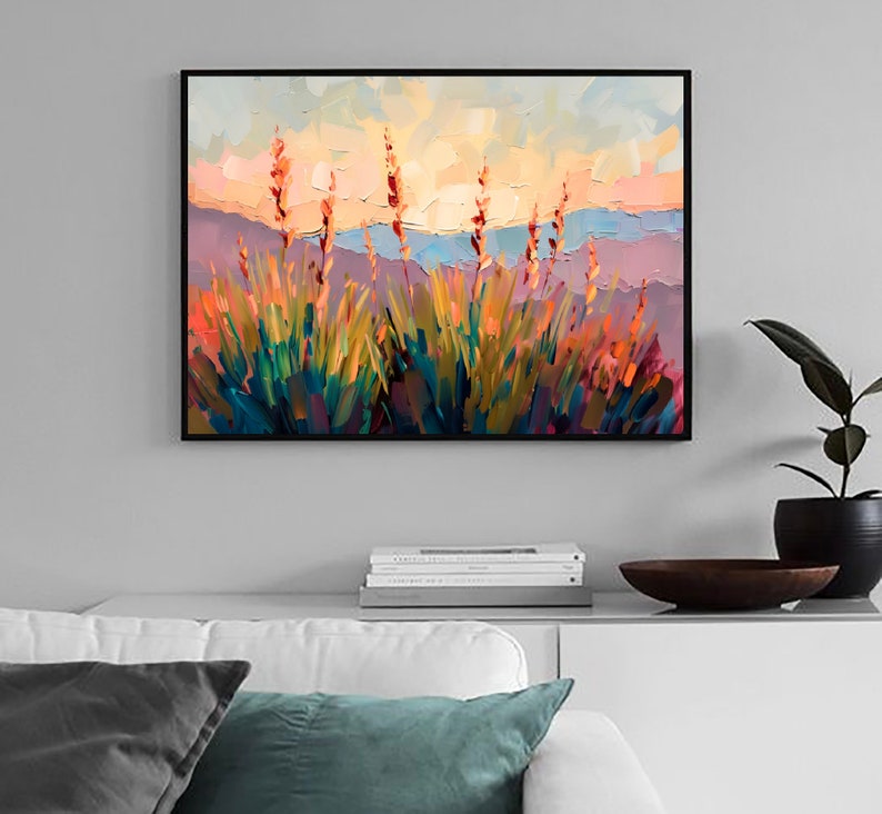 May include: A painting of a landscape with tall grass and a sunset in the background. The grass is painted in shades of green, blue, and yellow, and the sunset is painted in shades of orange, pink, and purple.