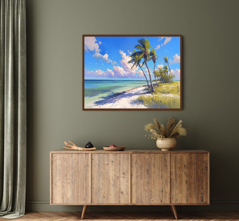 May include: A framed painting of a tropical beach scene with palm trees and a blue sky with white clouds. The beach is white sand and the water is a light blue.