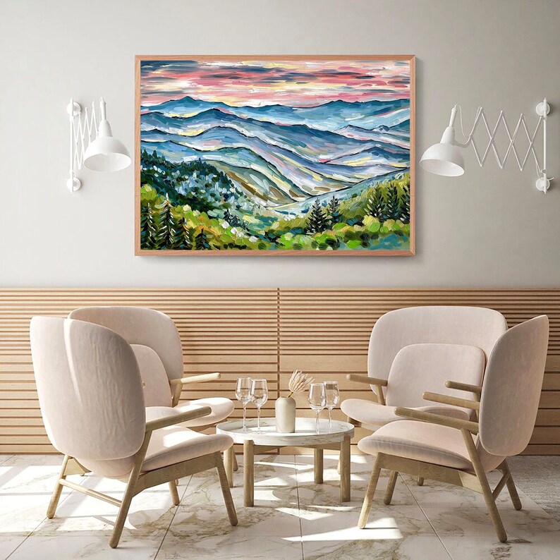 May include: A painting of a mountain landscape with a blue and green color scheme. The painting depicts a series of rolling hills with a forest in the foreground. The sky is a soft pink and orange color.