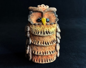 Handmade owl. Ceramic owl. Owl of clay. A symbol of wisdom. Sculpture of an owl. A gift for wise people.