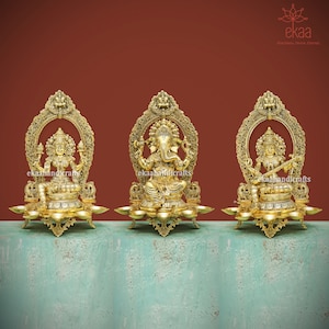 Brass Lord Ganesha Goddess Lakshmi and Saraswati Idols with 5 Oil Diya Holder, Ganesh Statue , Laxmi Maa Murti Saraswati Murti Home Temple