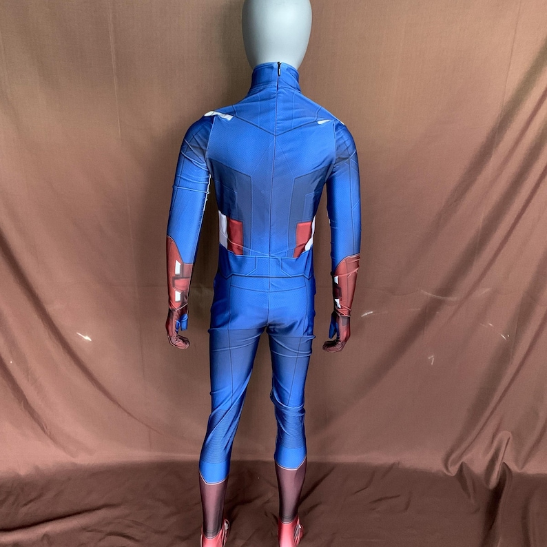May include: A blue and red spandex costume with a white star on the chest. The costume is designed to look like Captain America's suit.
