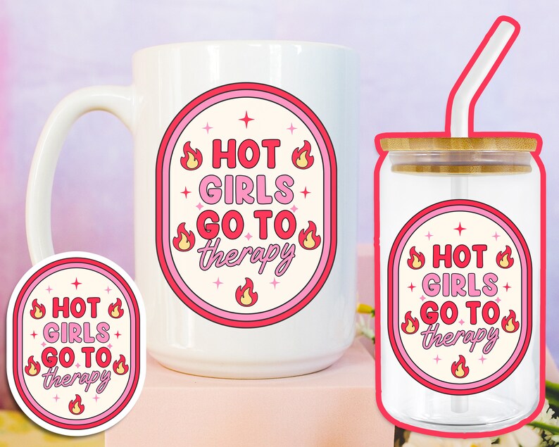 May include: A set of two pink and white mugs with the text "Hot Girls Go To Therapy" and a flame graphic. The mug on the left is a standard coffee mug, while the mug on the right is a glass tumbler with a straw.