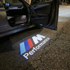 May include: A set of three ceramic mugs with a speckled, matte finish. The mugs are in shades of cream, light gray, and dark gray. Each mug has a simple, minimalist design, perfect for coffee or tea.