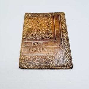 Vintage Latvian passport cover made of tooled leather in 1980s