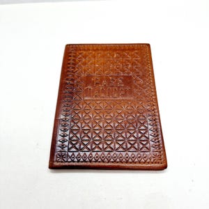 Vintage Latvian passport cover made of tooled leather in 1980s