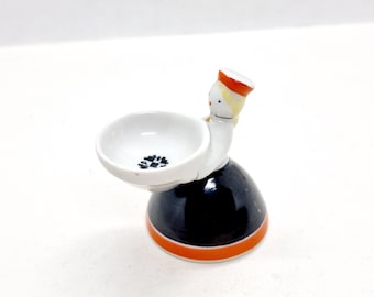 Latvian folk girl figurine with plate made o porcelain in USSR in 1970s