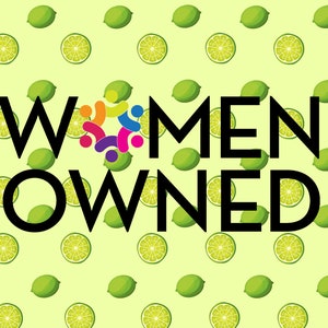 women-owned key lime art work with key limes in the background