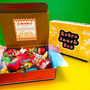 retro snack box, care package filled with candy and gummies and gushers, SpongeBob krabby patty, slime licker, nostalgic candy, bubble jug, baby bottle bop