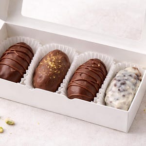 May include: A set of three ceramic mugs with a speckled, matte finish. The mugs are in shades of cream, light gray, and dark gray. Each mug has a simple, minimalist design, perfect for coffee or tea.