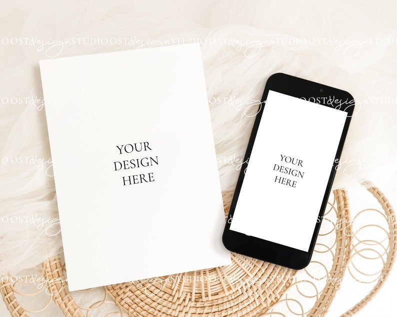 May include: A white card and a black smartphone mockup on a woven wicker surface with a white sheer fabric background. The card and phone both have the text "Your Design Here".